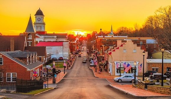 Sun Setting Over a Small Town