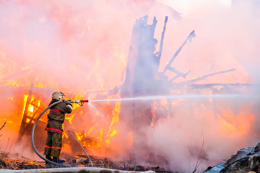 Fireman Extinguishes A Fire