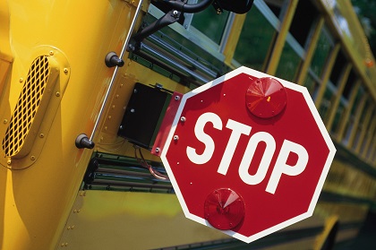 School Safety Sign on Bus