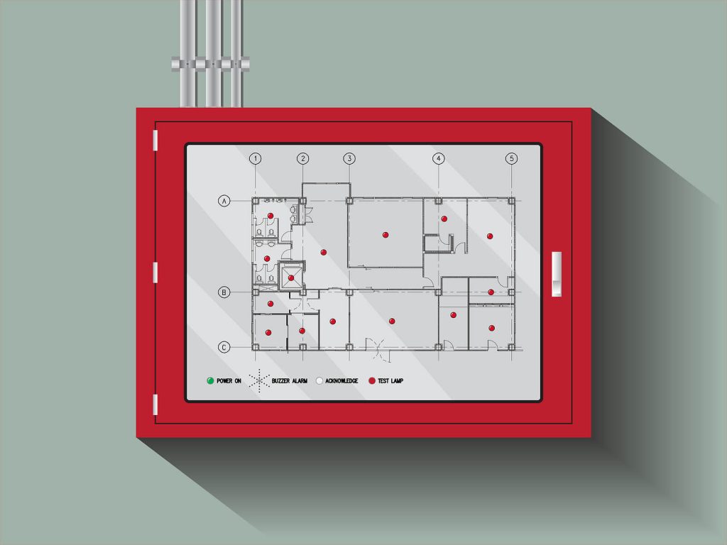 a commercial fire alarm system panel with building layout displayed mounted on a wall