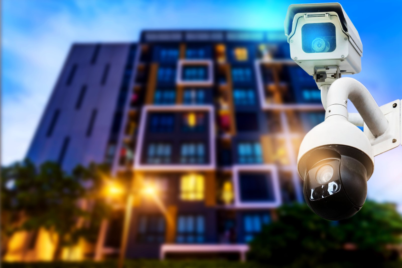 security cameras outside of an apartment complex protect the perimeter of the property