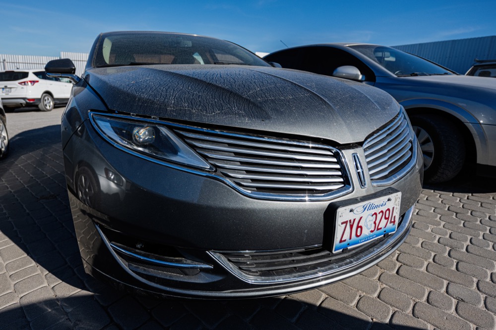 A security camera using license plate recognition technology to identify a car.