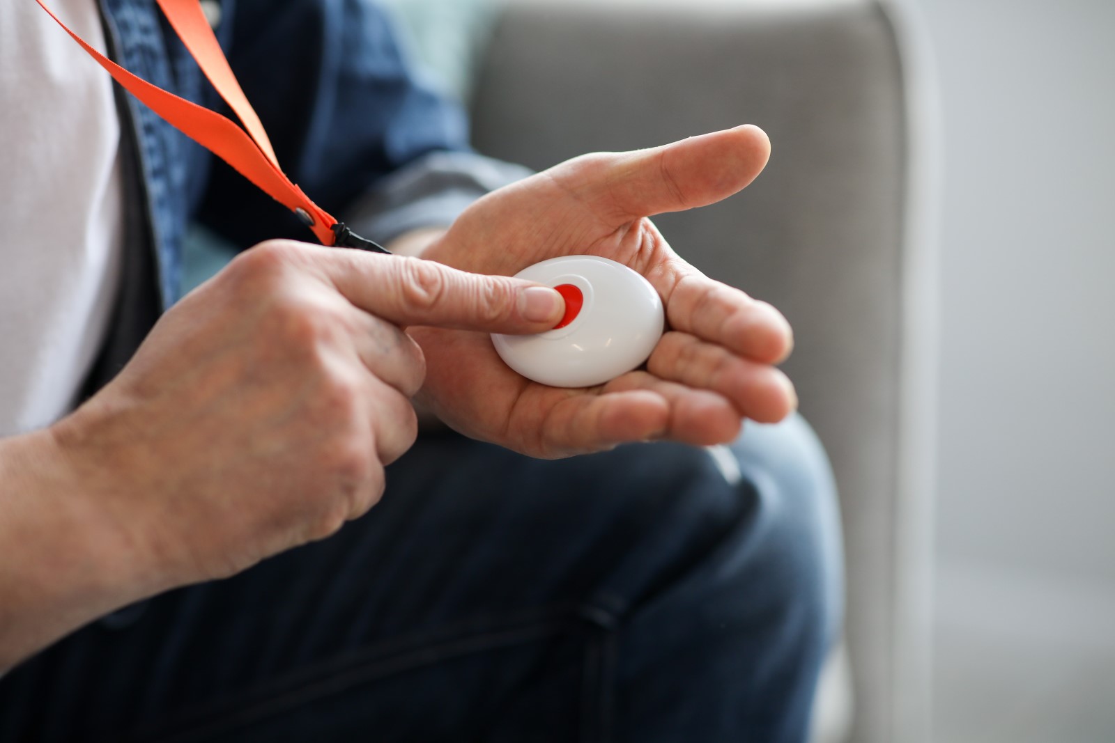 A school staff member pushes a wireless panic button to summon emergency help.